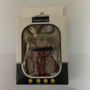 Air Pod cases, one new in box the green excellent condition used maybe one week